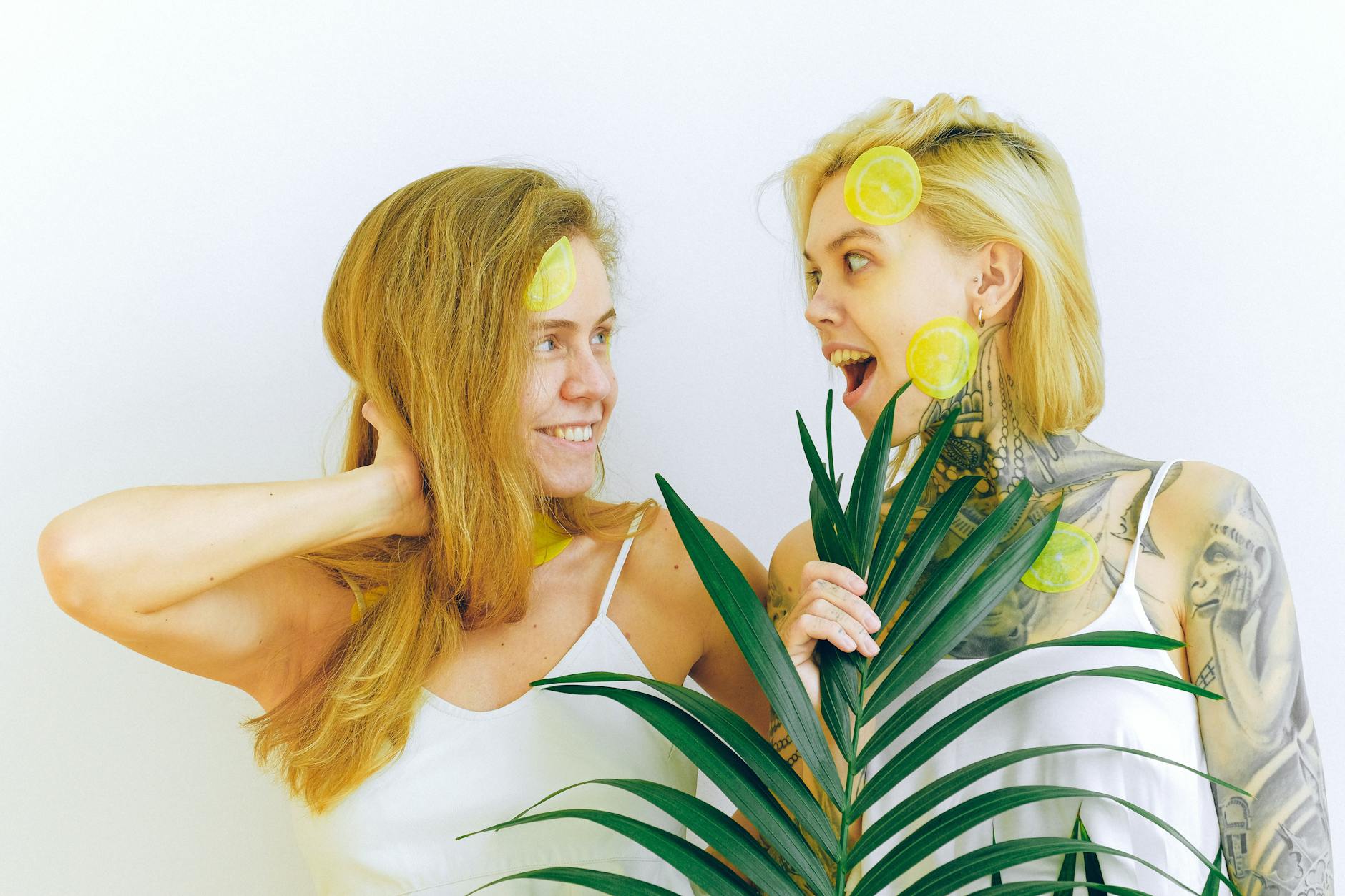 A young couple standing together indoors, exploring modern intimacy with a vibrator